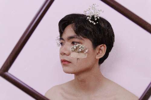 Boy over flowers