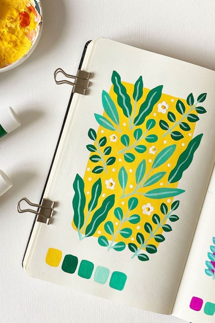 Tranh gouache lá xanh và hoa trắng trên khối nền vàng, dưới tranh là 5 ô màu đã dùng