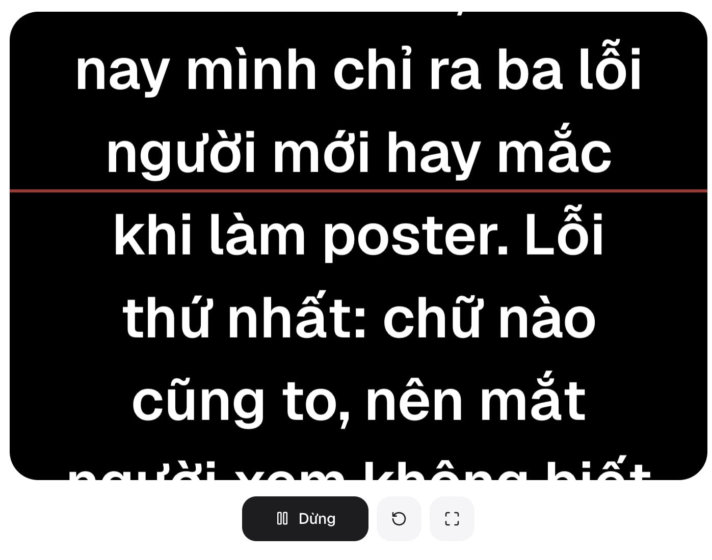 Máy nhắc chữ đang chạy chữ cỡ lớn trên nền đen với vạch đỏ làm mốc