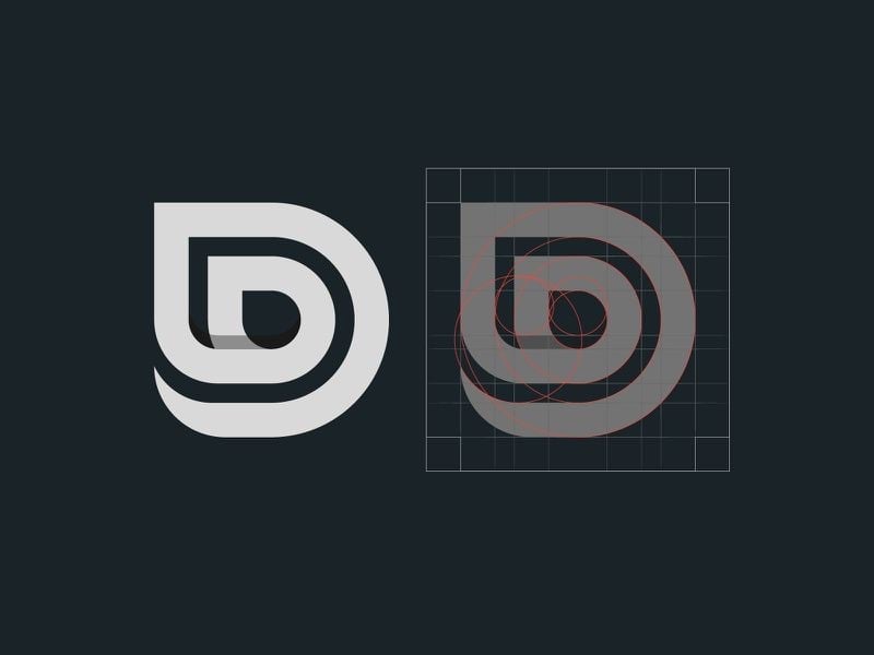 Logo chữ D xám trắng trên nền đen, nét viền chữ D ôm một chữ D nhỏ hình giọt nước bên trong, kèm bản dựng trên lưới và vòng tròn