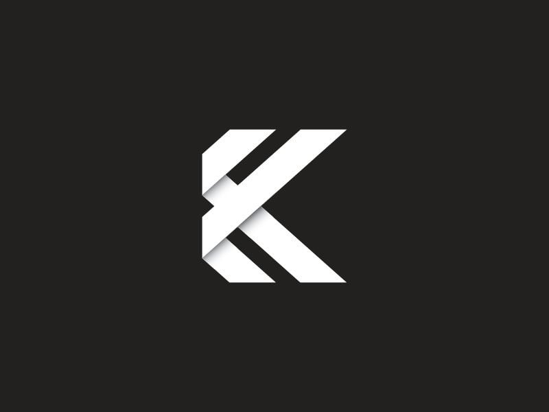Logo chữ K trắng trên nền đen dựng từ các dải giấy gấp chồng lên nhau, có bóng ở chỗ gấp