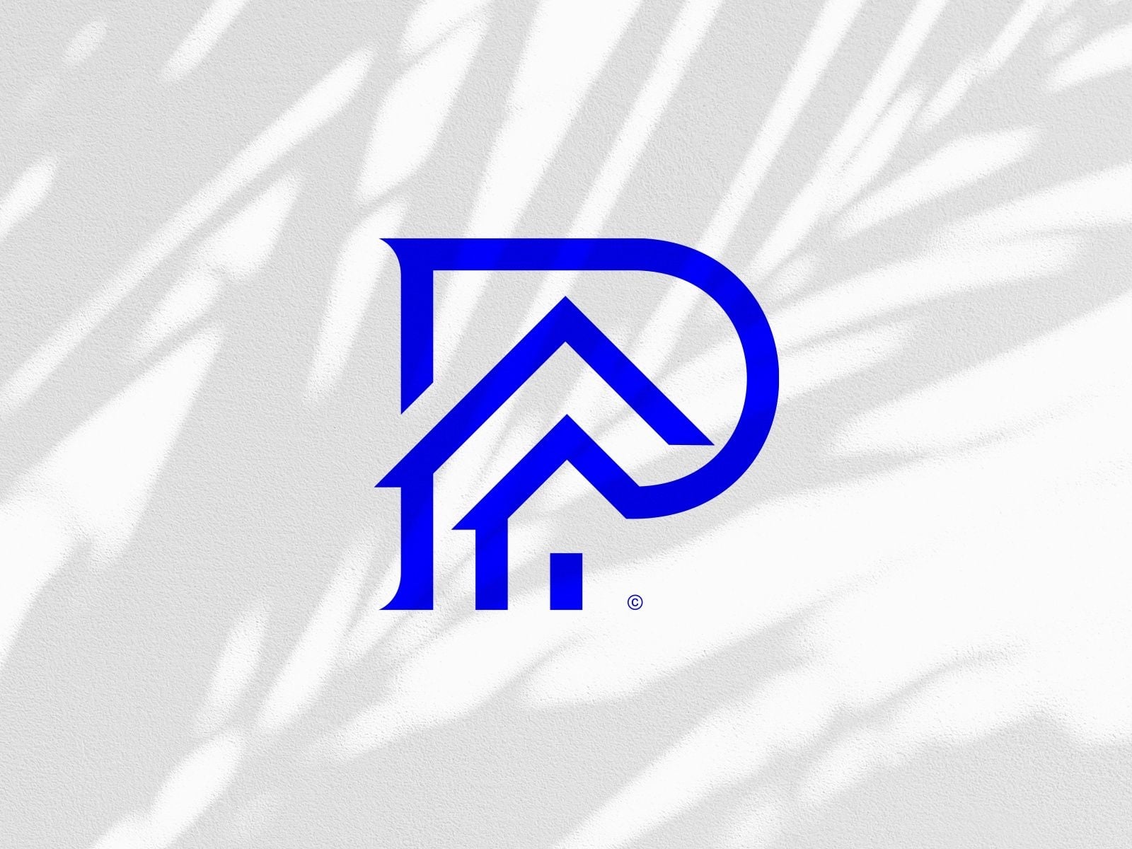 Logo chữ P xanh lam nét đều, bên trong có hai mái nhà lồng nhau